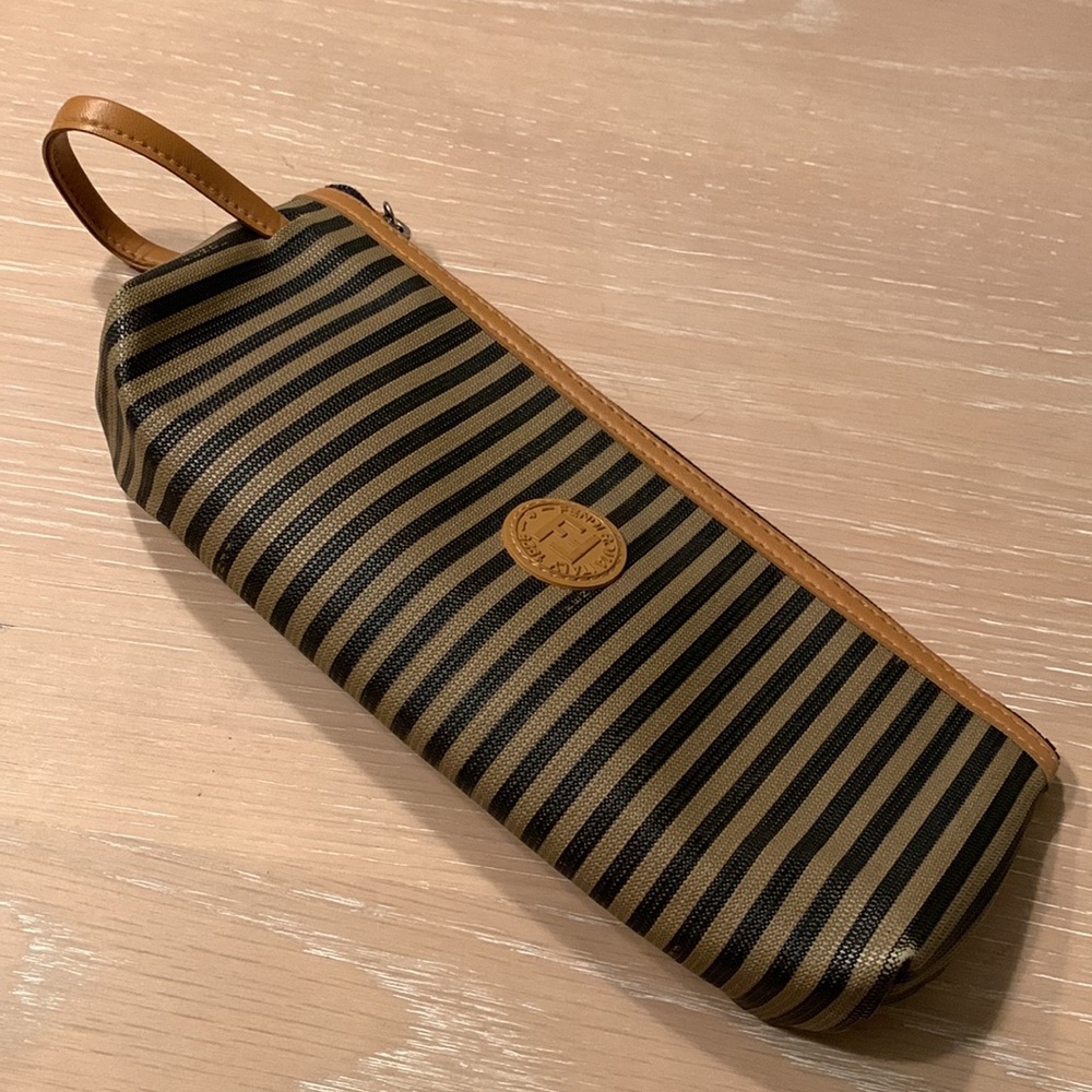 Classic Fendi Wristlet clean inside and out, pull out strap. Very good condition